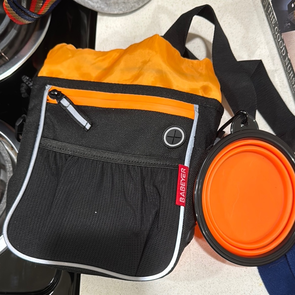 Dog treat holder with drinking cup